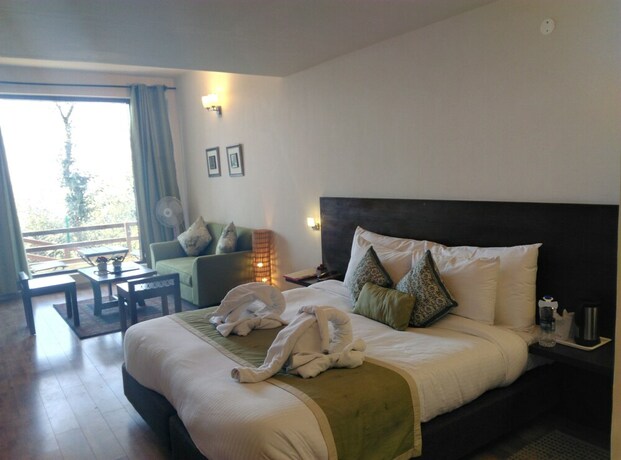 Imagen de la habitación del Hotel Woodsmoke Resort And Spa. Foto 28