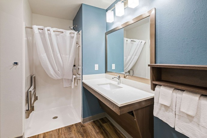 Imagen de la habitación del Hotel Woodspring Suites Broken Arrow. Foto 12