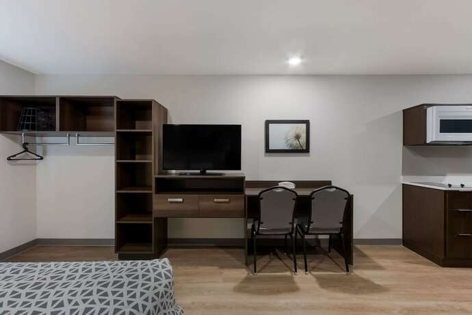 Imagen de la habitación del Hotel Woodspring Suites Chandler Airport. Foto 17