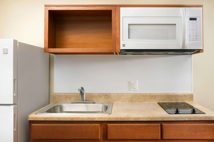 Imagen de la habitación del Hotel Woodspring Suites Chicago Romeoville. Foto 12