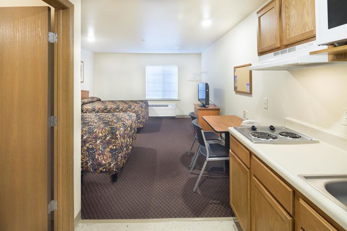 Imagen de los exteriores del Hotel Woodspring Suites Columbus Fort Benning Bldg. 1. Foto 14
