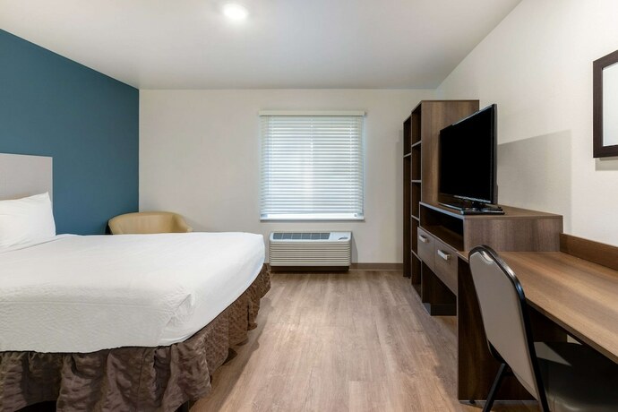 Imagen de la habitación del Hotel Woodspring Suites Gurnee - Chicago. Foto 13