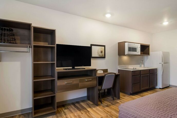 Imagen de la habitación del Hotel Woodspring Suites Jacksonville - South. Foto 20