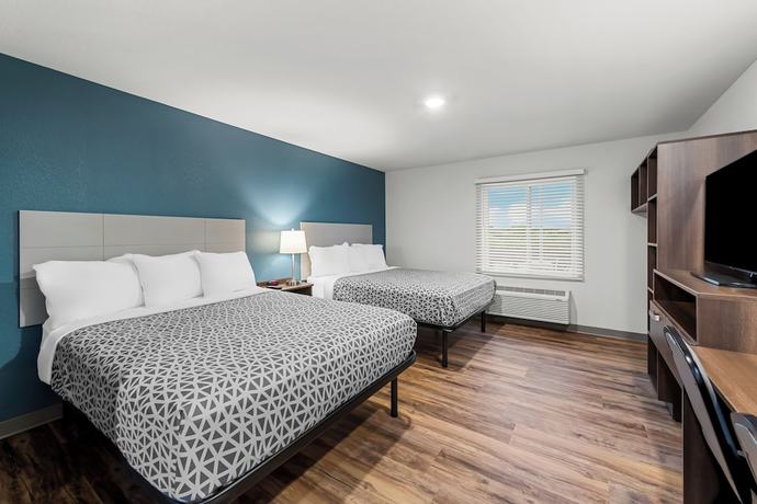 Imagen de la habitación del Hotel Woodspring Suites Kansas City Airport. Foto 2