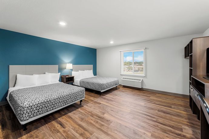 Imagen de la habitación del Hotel Woodspring Suites Kansas City Airport. Foto 5