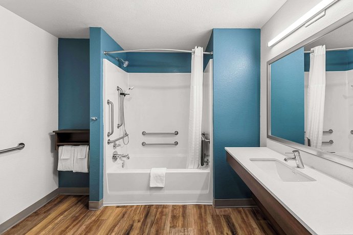 Imagen de la habitación del Hotel Woodspring Suites Kansas City Airport. Foto 6