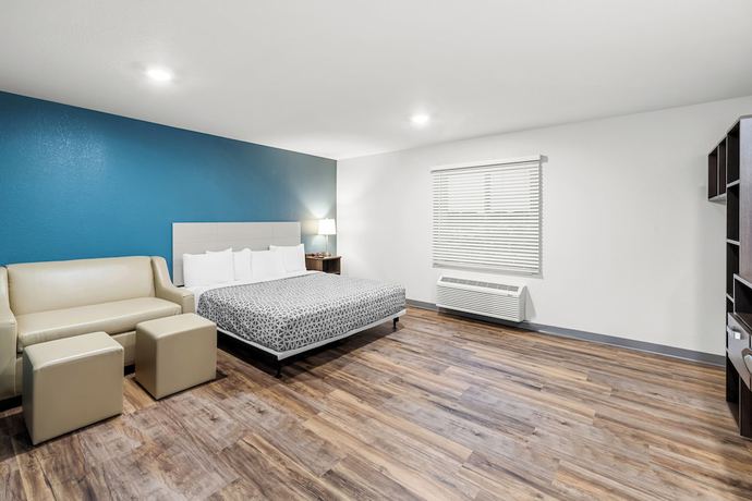 Imagen de la habitación del Hotel Woodspring Suites Kansas City Airport. Foto 9
