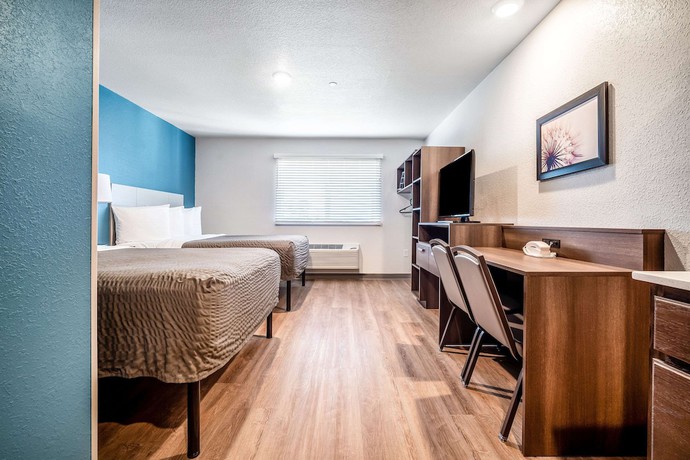 Imagen de la habitación del Hotel Woodspring Suites Naples West. Foto 9
