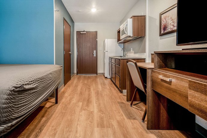 Imagen de la habitación del Hotel Woodspring Suites Naples West. Foto 14