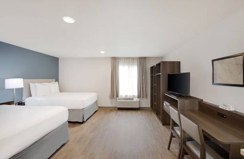 Imagen de la habitación del Hotel Woodspring Suites Plano - North Dallas. Foto 4