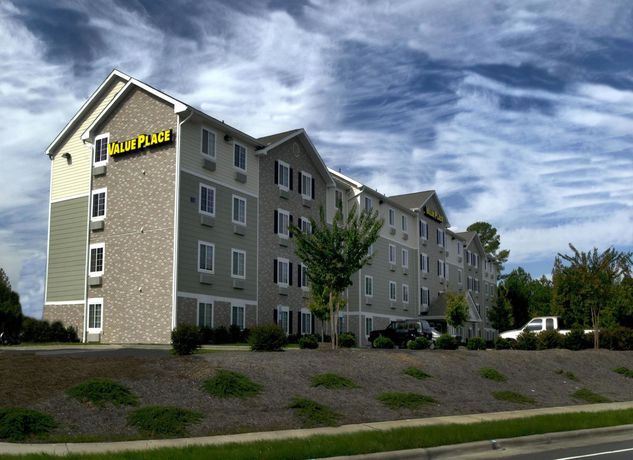Imagen de los exteriores del Hotel Woodspring Suites Raleigh Apex. Foto 13