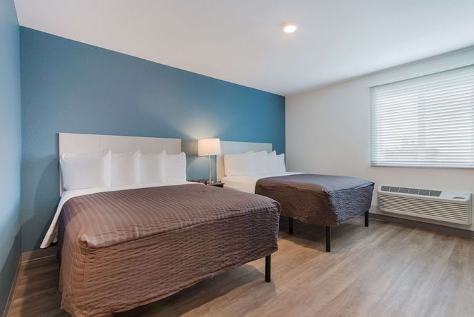 Imagen de la habitación del Hotel Woodspring Suites Tamarac. Foto 5