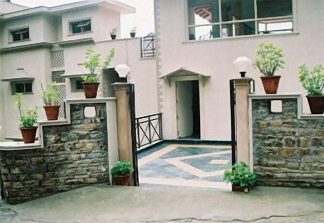Imagen general del Hotel Woodsvilla Residency. Foto 12