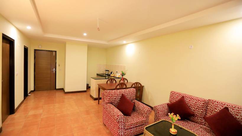 Imagen de la habitación del Hotel Woodsvilla Resort. Foto 15