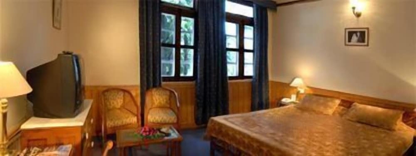 Imagen de la habitación del Hotel Woodville Palace by Signum. Foto 11