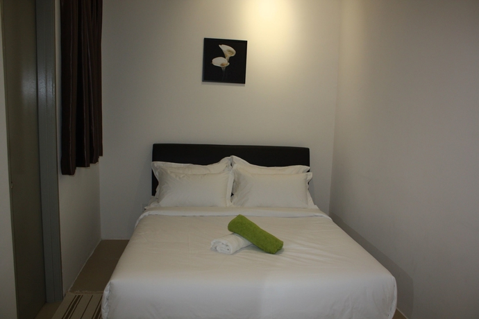 Imagen de la habitación del Hotel Woodz Highland Apartment. Foto 6