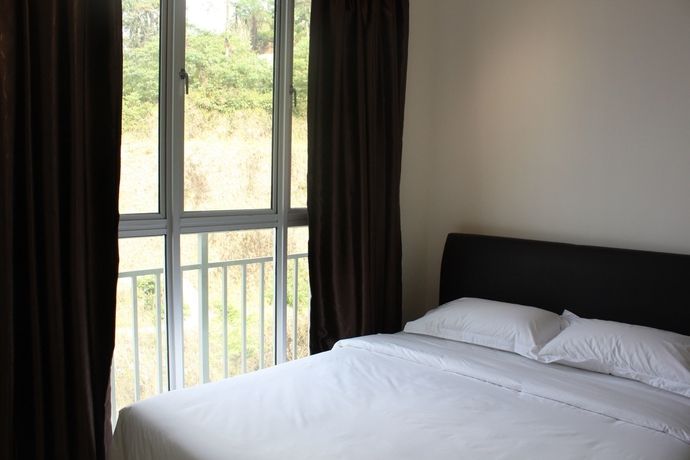 Imagen de la habitación del Hotel Woodz Highland Apartment. Foto 7