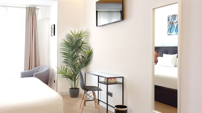 Imagen de la habitación del Hotel Woohoo Rooms Boutique Gran Vía. Foto 2