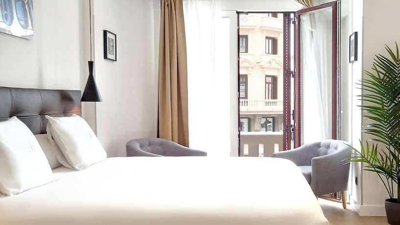 Imagen de la habitación del Hotel Woohoo Rooms Boutique Gran Vía. Foto 3