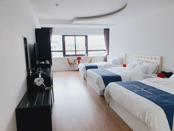 Imagen de la habitación del Hotel Wooin. Foto 26