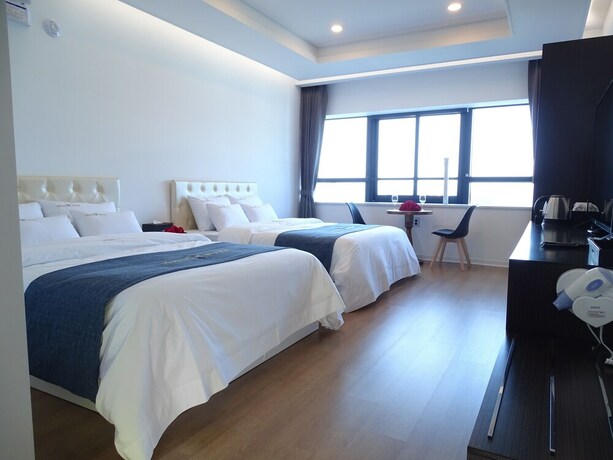 Imagen de la habitación del Hotel Wooin. Foto 27