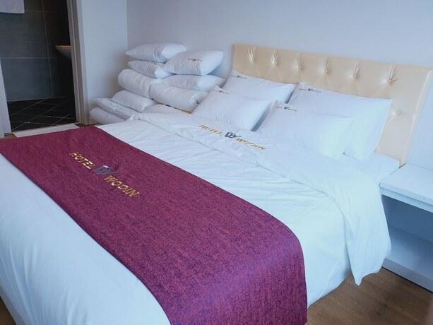 Imagen de la habitación del Hotel Wooin. Foto 28