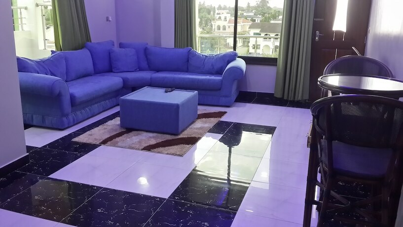 Imagen de la habitación del Hotel Woolsack Suites. Foto 16