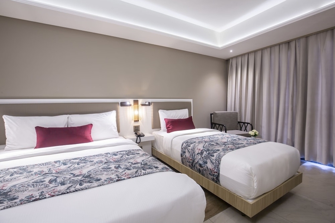 Imagen de la habitación del Hotel Woovo Phuket Patong. Foto 17