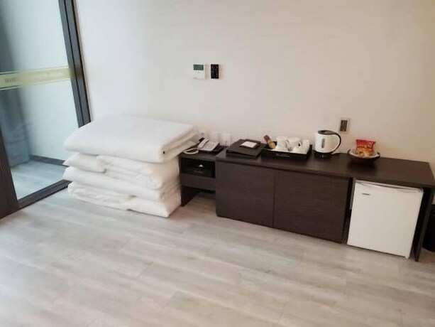 Imagen de la habitación del Hotel Wooyeon Flora. Foto 13