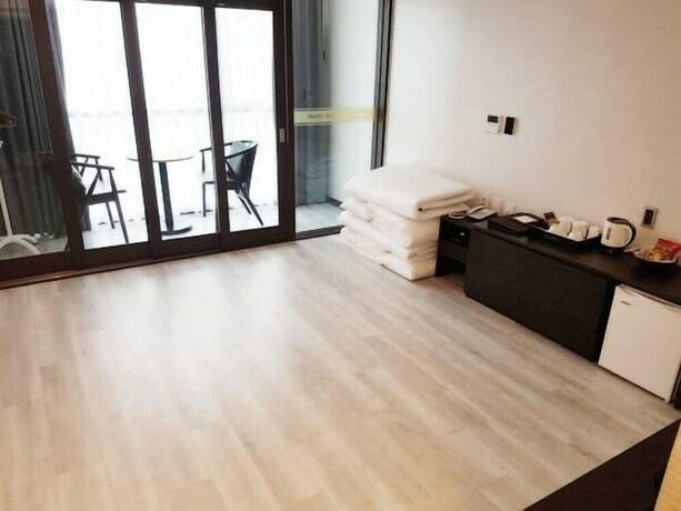 Imagen de la habitación del Hotel Wooyeon Flora. Foto 31