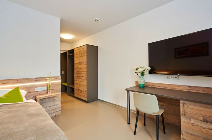 Imagen de la habitación del Hotel Workers Home. Foto 12