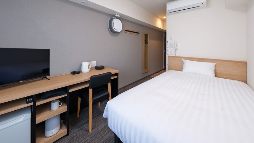 Imagen de la habitación del Hotel Workers Kumamoto Ozu. Foto 2