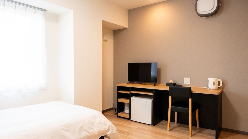 Imagen de la habitación del Hotel Workers Kumamoto Ozu. Foto 5