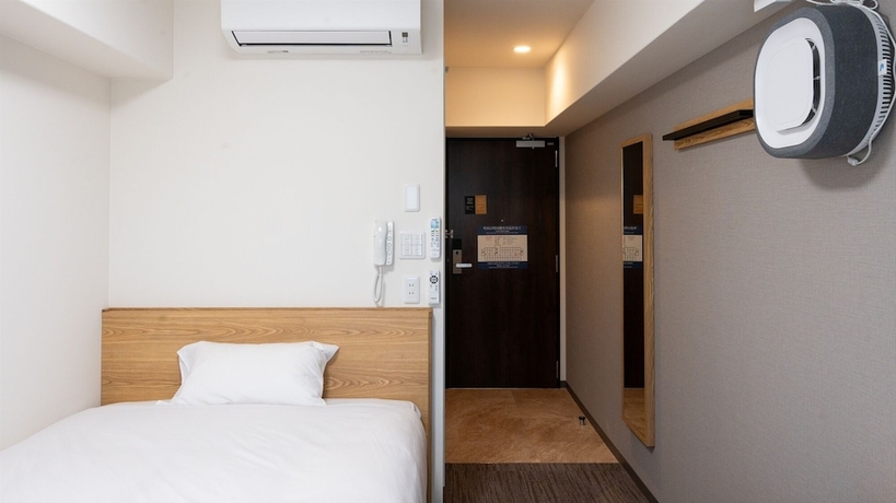 Imagen de la habitación del Hotel Workers Kumamoto Ozu. Foto 8