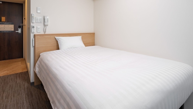 Imagen de la habitación del Hotel Workers Kumamoto Ozu. Foto 9