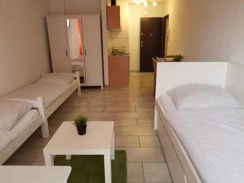 Imagen de la habitación del Hotel Workers-Sleep-Station. Foto 12
