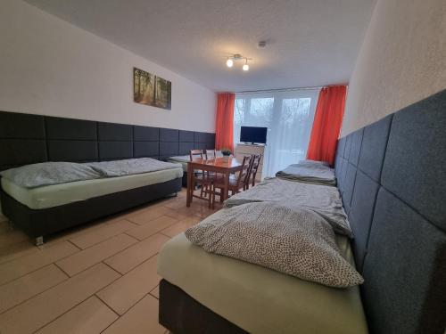 Imagen de la habitación del Hotel Workers-Sleep-Station. Foto 19
