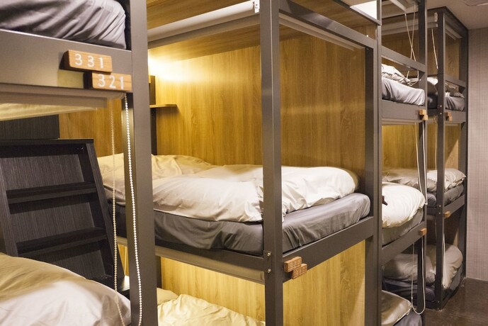 Imagen de la habitación del Hotel Workinn Central - Caters To Women. Foto 10