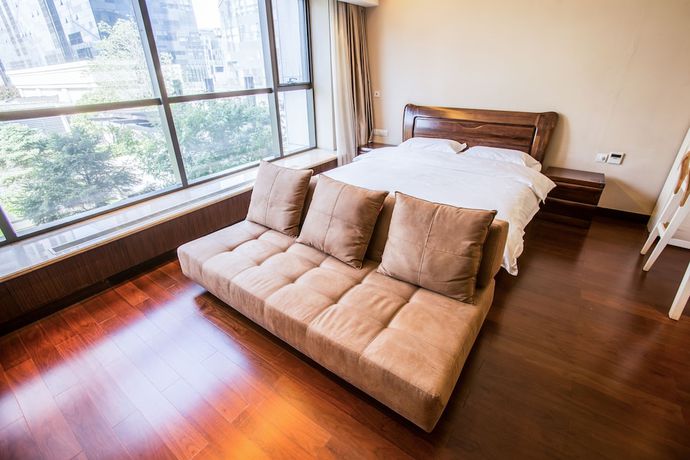 Imagen de la habitación del Hotel World City Jiamei Service Apartment. Foto 2