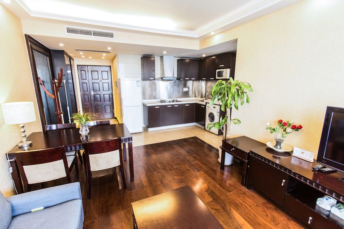 Imagen de la habitación del Hotel World City Jiamei Service Apartment. Foto 4