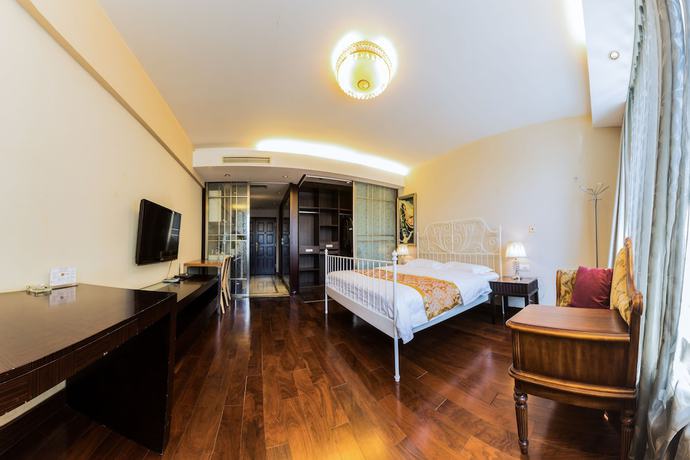 Imagen de la habitación del Hotel World City Jiamei Service Apartment. Foto 6