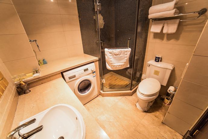 Imagen de la habitación del Hotel World City Jiamei Service Apartment. Foto 7