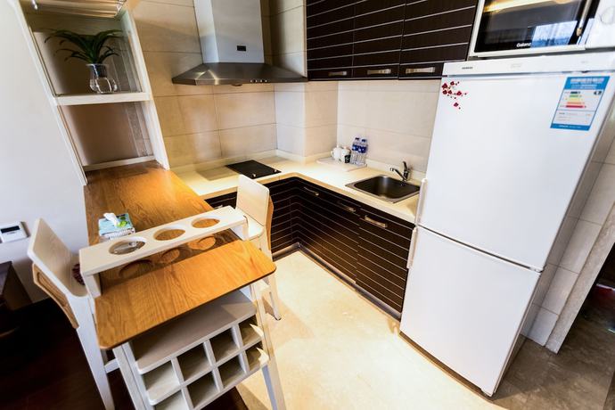 Imagen de la habitación del Hotel World City Jiamei Service Apartment. Foto 8