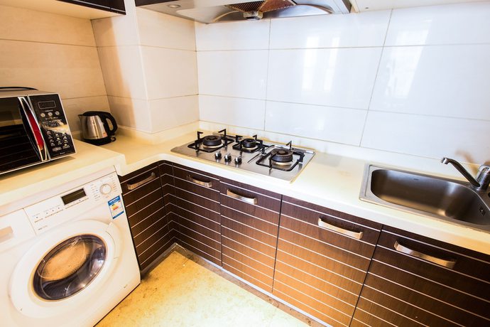Imagen de la habitación del Hotel World City Jiamei Service Apartment. Foto 10