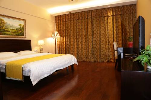 Imagen de la habitación del Hotel World City Jiamei Service Apartment. Foto 11
