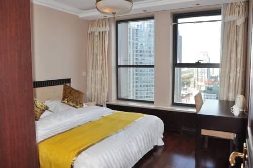 Imagen de la habitación del Hotel World City Jiamei Service Apartment. Foto 12
