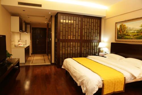 Imagen de la habitación del Hotel World City Jiamei Service Apartment. Foto 13