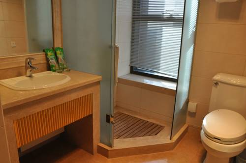 Imagen de la habitación del Hotel World City Jiamei Service Apartment. Foto 15