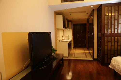 Imagen de la habitación del Hotel World City Jiamei Service Apartment. Foto 16