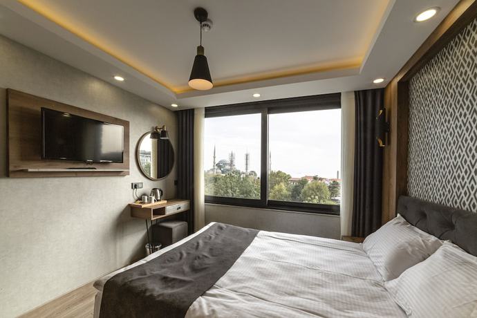 Imagen de la habitación del Hotel World Heritage Center. Foto 12